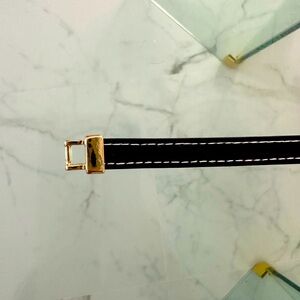 Brown leather bracelet with gold clasp similar to Hermes bracelets
